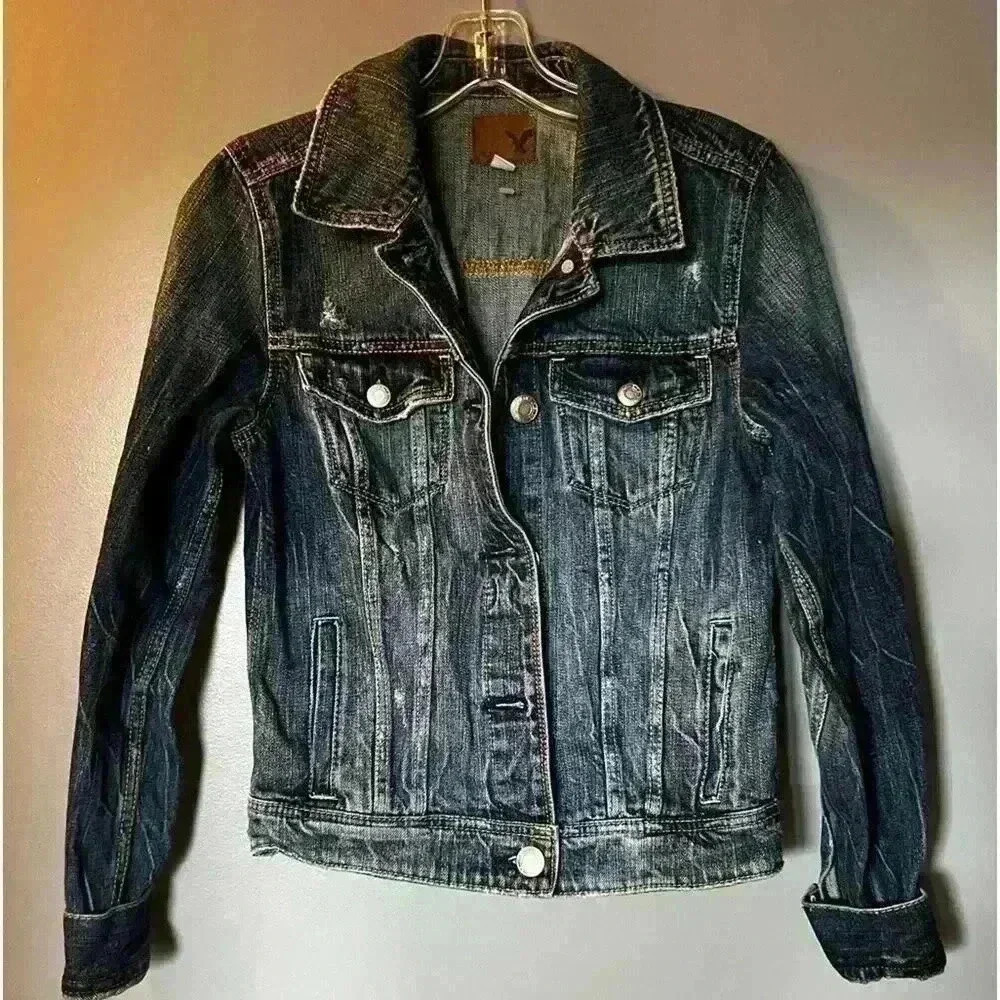 American Eagle Outfitters Jean Jacket with Faux "aging tears" vintage look